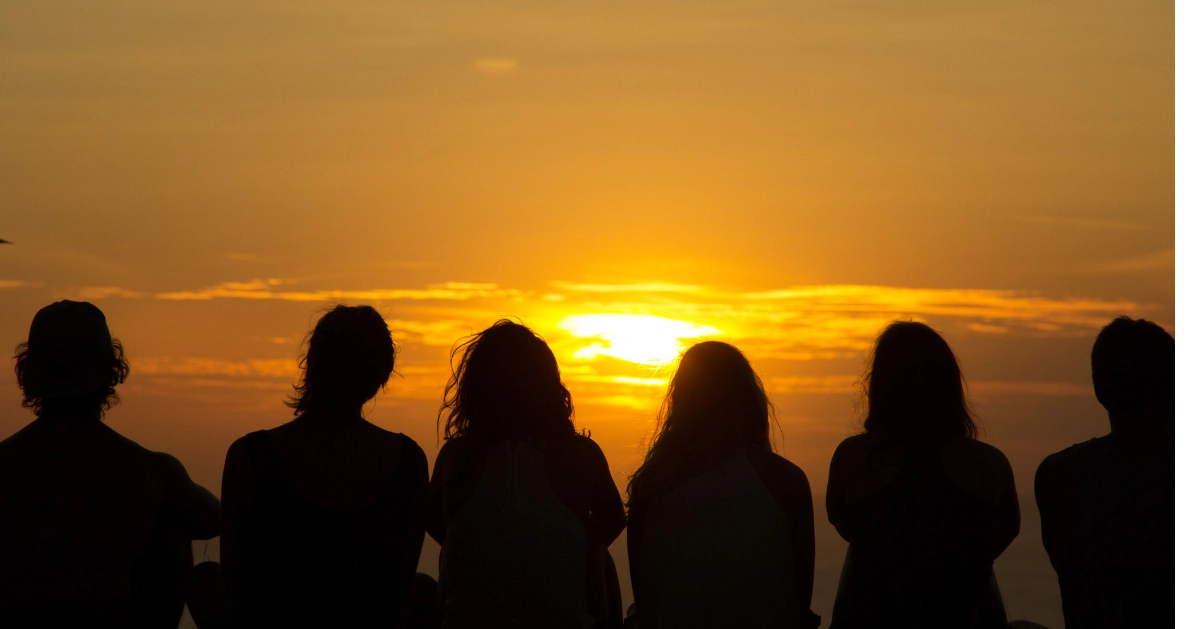 teens watching the sunset