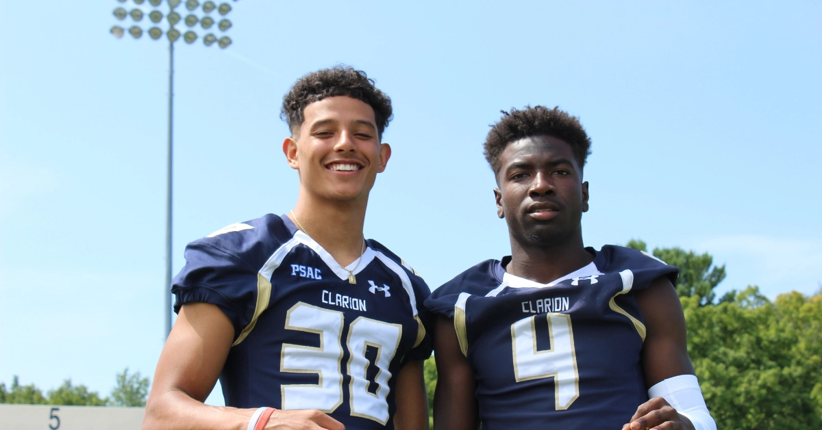 two guys smiling