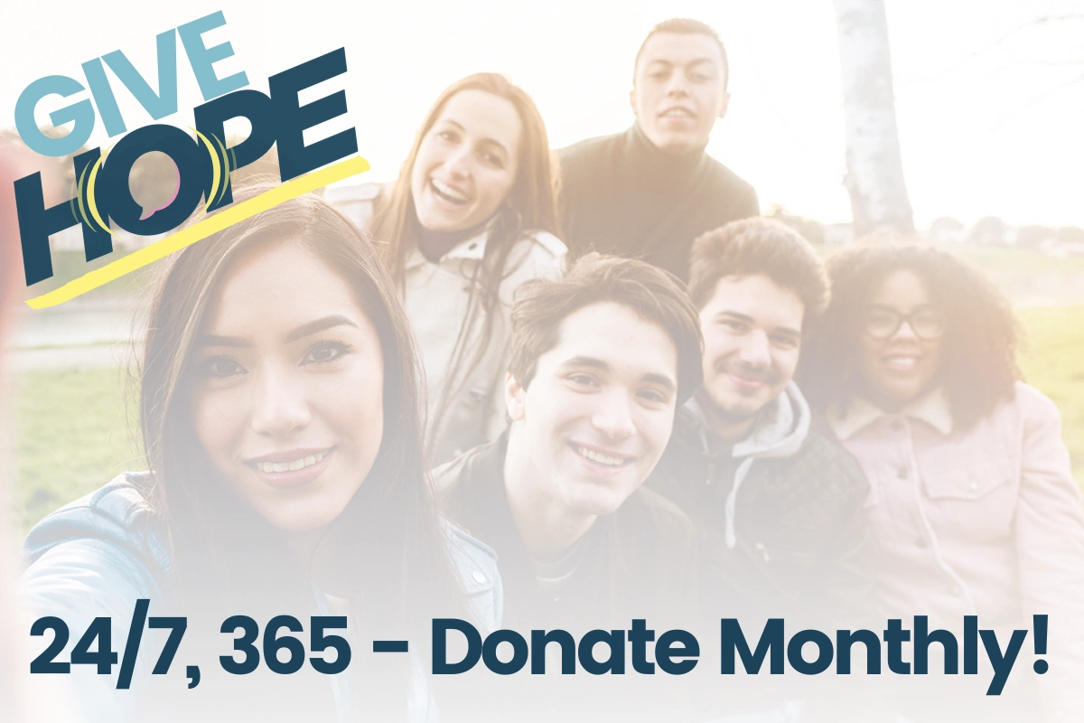 A diverse group of smiling young adults sits outdoors under the text GIVE HOPE. Below, large text reads 24/7, 365 – Donate Monthly! promoting ongoing charitable donations.